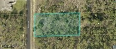 Discover a rare gem in Lehigh Acres, Southwest Florida-a prime on Lehigh Resort Club in Florida - for sale on GolfHomes.com, golf home, golf lot