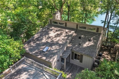 Quaint Lakefront Cottage with unmatched Lake Views.  A wall of on The Highlands Course at Lake Arrowhead in Georgia - for sale on GolfHomes.com, golf home, golf lot