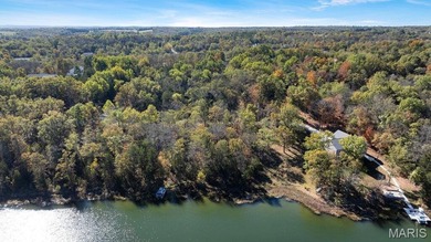 Discover the perfect canvas for your dream home on this stunning on Cottonwood Golf Course in Missouri - for sale on GolfHomes.com, golf home, golf lot