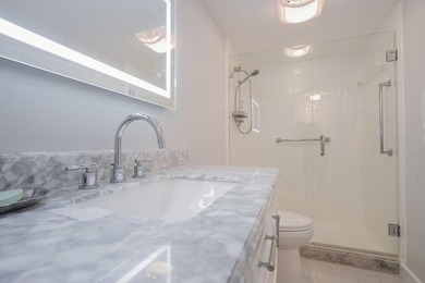 Step into this beautifully renovated, move-in ready first floor on Wynmoor Golf Course in Florida - for sale on GolfHomes.com, golf home, golf lot