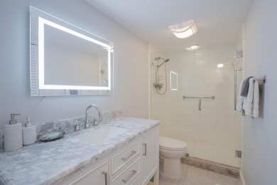 Step into this beautifully renovated, move-in ready first floor on Wynmoor Golf Course in Florida - for sale on GolfHomes.com, golf home, golf lot