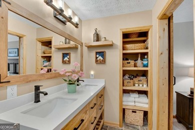 Welcome to this beautifully maintained 4-bedroom, 3-bath ranch on Bent Tree Golf Course in Georgia - for sale on GolfHomes.com, golf home, golf lot