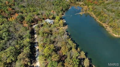 Discover the perfect canvas for your dream home on this stunning on Cottonwood Golf Course in Missouri - for sale on GolfHomes.com, golf home, golf lot