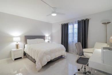 Step into this beautifully renovated, move-in ready first floor on Wynmoor Golf Course in Florida - for sale on GolfHomes.com, golf home, golf lot