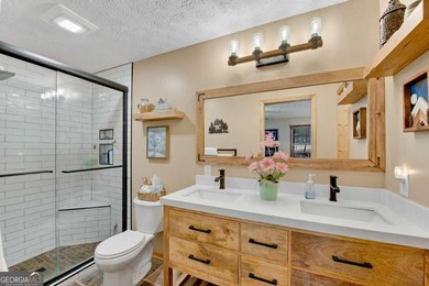 Welcome to this beautifully maintained 4-bedroom, 3-bath ranch on Bent Tree Golf Course in Georgia - for sale on GolfHomes.com, golf home, golf lot