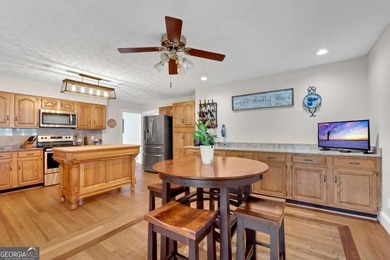 Welcome to this beautifully maintained 4-bedroom, 3-bath ranch on Bent Tree Golf Course in Georgia - for sale on GolfHomes.com, golf home, golf lot