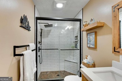 Welcome to this beautifully maintained 4-bedroom, 3-bath ranch on Bent Tree Golf Course in Georgia - for sale on GolfHomes.com, golf home, golf lot