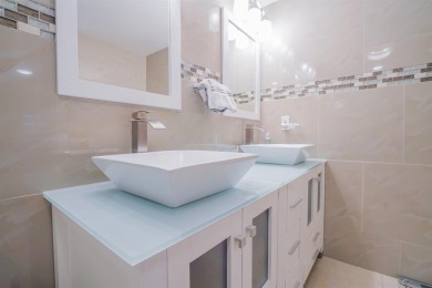 Step into this beautifully renovated, move-in ready first floor on Wynmoor Golf Course in Florida - for sale on GolfHomes.com, golf home, golf lot