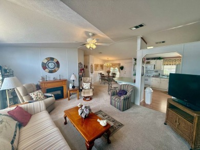 Home is located in Water Oak Country Club Estates in Lady Lake on Water Oak Country Club Estates in Florida - for sale on GolfHomes.com, golf home, golf lot