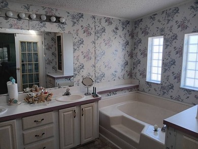 Great Home, Great Location & Extreme Storage potential!! $127 on Four Lakes Golf Club in Florida - for sale on GolfHomes.com, golf home, golf lot