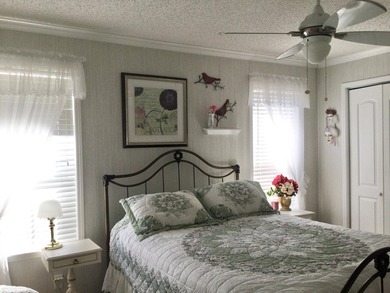 Meticulously maintained home in the much sought after Spanish on Spanish Lakes I in Florida - for sale on GolfHomes.com, golf home, golf lot