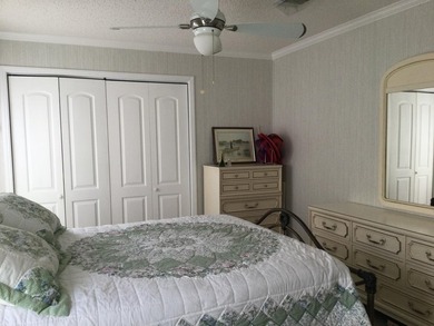 Meticulously maintained home in the much sought after Spanish on Spanish Lakes I in Florida - for sale on GolfHomes.com, golf home, golf lot