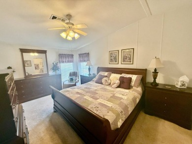 Home is located in Water Oak Country Club Estates in Lady Lake on Water Oak Country Club Estates in Florida - for sale on GolfHomes.com, golf home, golf lot