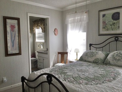 Meticulously maintained home in the much sought after Spanish on Spanish Lakes I in Florida - for sale on GolfHomes.com, golf home, golf lot