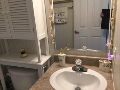 Meticulously maintained home in the much sought after Spanish on Spanish Lakes I in Florida - for sale on GolfHomes.com, golf home, golf lot