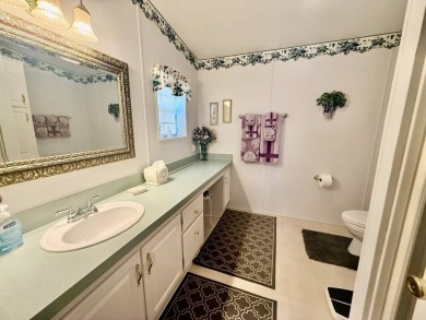 Home is located in Water Oak Country Club Estates in Lady Lake on Water Oak Country Club Estates in Florida - for sale on GolfHomes.com, golf home, golf lot