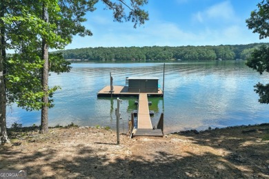 Listed below the current appraisal, this isn't just another on Lanier Island Legacy Golf Couorse in Georgia - for sale on GolfHomes.com, golf home, golf lot