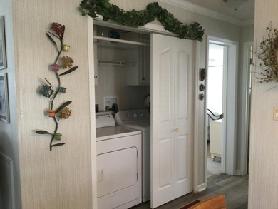 Meticulously maintained home in the much sought after Spanish on Spanish Lakes I in Florida - for sale on GolfHomes.com, golf home, golf lot