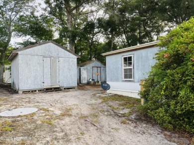 Welcome to Seaside Station in beautiful Sunset Beach, North on Oyster Bay Golf Links in North Carolina - for sale on GolfHomes.com, golf home, golf lot