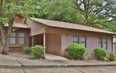 This desirable 3BR, 2BA one-level established  property is fully on DeSoto Golf Course in Arkansas - for sale on GolfHomes.com, golf home, golf lot