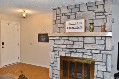 This desirable 3BR, 2BA one-level established  property is fully on DeSoto Golf Course in Arkansas - for sale on GolfHomes.com, golf home, golf lot