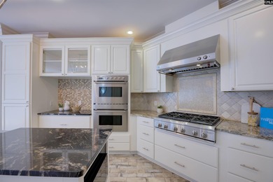 Tucked at the end of a quiet cul-de-sac, this stunning all-brick on The Members Club At Woodcreek in South Carolina - for sale on GolfHomes.com, golf home, golf lot