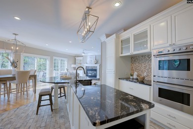 Tucked at the end of a quiet cul-de-sac, this stunning all-brick on The Members Club At Woodcreek in South Carolina - for sale on GolfHomes.com, golf home, golf lot