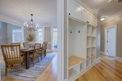 Tucked at the end of a quiet cul-de-sac, this stunning all-brick on The Members Club At Woodcreek in South Carolina - for sale on GolfHomes.com, golf home, golf lot