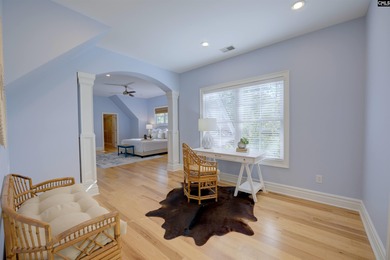 Tucked at the end of a quiet cul-de-sac, this stunning all-brick on The Members Club At Woodcreek in South Carolina - for sale on GolfHomes.com, golf home, golf lot