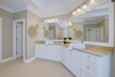 Tucked at the end of a quiet cul-de-sac, this stunning all-brick on The Members Club At Woodcreek in South Carolina - for sale on GolfHomes.com, golf home, golf lot