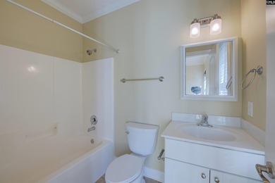 Tucked at the end of a quiet cul-de-sac, this stunning all-brick on The Members Club At Woodcreek in South Carolina - for sale on GolfHomes.com, golf home, golf lot