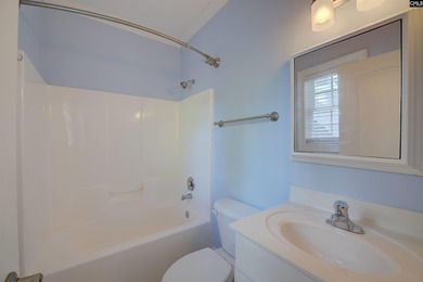 Tucked at the end of a quiet cul-de-sac, this stunning all-brick on The Members Club At Woodcreek in South Carolina - for sale on GolfHomes.com, golf home, golf lot