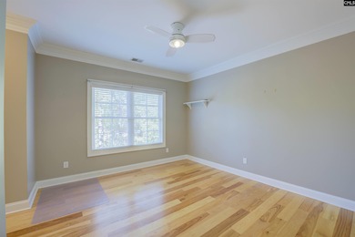 Tucked at the end of a quiet cul-de-sac, this stunning all-brick on The Members Club At Woodcreek in South Carolina - for sale on GolfHomes.com, golf home, golf lot