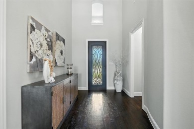 Backed by sweeping golf course views and designed with both on Lantana Golf Club in Texas - for sale on GolfHomes.com, golf home, golf lot