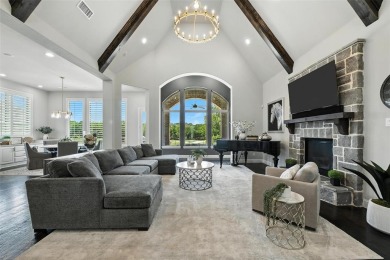 Backed by sweeping golf course views and designed with both on Lantana Golf Club in Texas - for sale on GolfHomes.com, golf home, golf lot