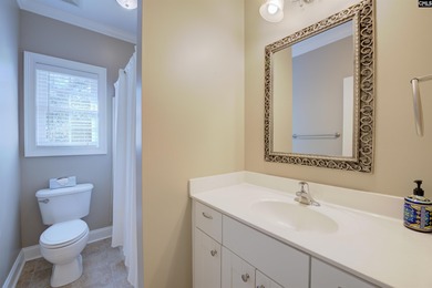 Tucked at the end of a quiet cul-de-sac, this stunning all-brick on The Members Club At Woodcreek in South Carolina - for sale on GolfHomes.com, golf home, golf lot