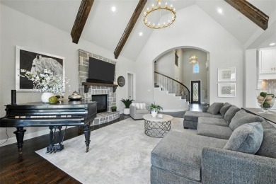 Backed by sweeping golf course views and designed with both on Lantana Golf Club in Texas - for sale on GolfHomes.com, golf home, golf lot