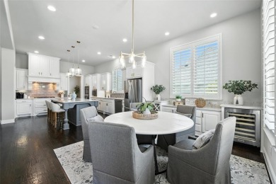 Backed by sweeping golf course views and designed with both on Lantana Golf Club in Texas - for sale on GolfHomes.com, golf home, golf lot