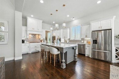 Backed by sweeping golf course views and designed with both on Lantana Golf Club in Texas - for sale on GolfHomes.com, golf home, golf lot