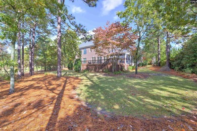 Tucked at the end of a quiet cul-de-sac, this stunning all-brick on The Members Club At Woodcreek in South Carolina - for sale on GolfHomes.com, golf home, golf lot