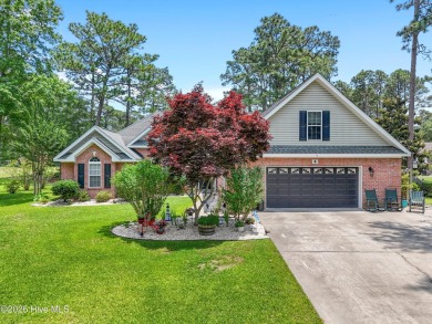 Discover this stunning brick home on just under half an acre on Carolina Shores Golf Course in North Carolina - for sale on GolfHomes.com, golf home, golf lot