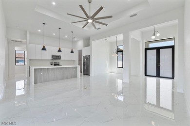 Experience elevated Florida living in this exceptional new on Burnt Store Golf Club in Florida - for sale on GolfHomes.com, golf home, golf lot