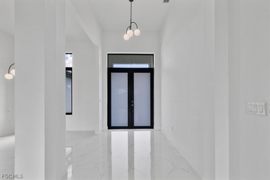 Experience elevated Florida living in this exceptional new on Burnt Store Golf Club in Florida - for sale on GolfHomes.com, golf home, golf lot