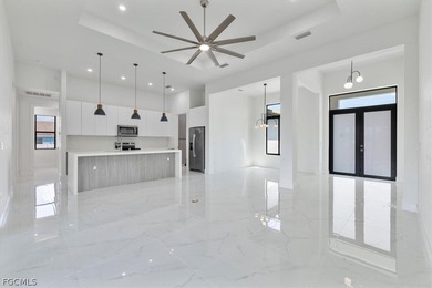 Experience elevated Florida living in this exceptional new on Burnt Store Golf Club in Florida - for sale on GolfHomes.com, golf home, golf lot