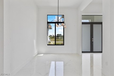 Experience elevated Florida living in this exceptional new on Burnt Store Golf Club in Florida - for sale on GolfHomes.com, golf home, golf lot