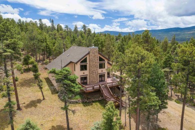 At 3,280 square feet, this mountain vacation home was made to on Angel Fire Resort Country Club in New Mexico - for sale on GolfHomes.com, golf home, golf lot