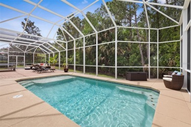 Welcome to your private oasis in the highly sought-after gated on Plantation Bay Golf and Country Club in Florida - for sale on GolfHomes.com, golf home, golf lot