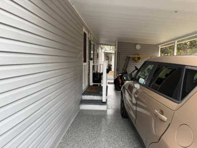 Beautifully Renovated 2-Bedroom, 2-Bath Double Wide Home in on Rolling Greens Executive Golf Community in Florida - for sale on GolfHomes.com, golf home, golf lot