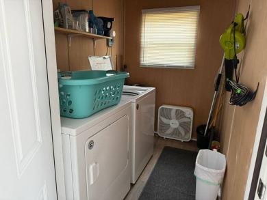 Beautifully Renovated 2-Bedroom, 2-Bath Double Wide Home in on Rolling Greens Executive Golf Community in Florida - for sale on GolfHomes.com, golf home, golf lot