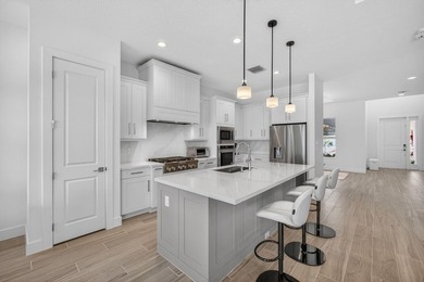 Waterfront living meets effortless luxury in this fully upgraded on Palm Beach Gardens Golf Course in Florida - for sale on GolfHomes.com, golf home, golf lot